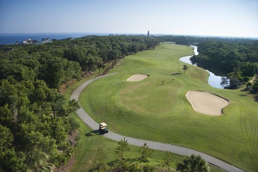 Aerial view of golf course in coastal residential community at Bald Head Island, North Carolina.