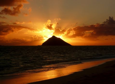 Tropical sunrise at Lanikai Beach, Oahu, Hawaii.