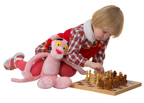 Little girl play chess on the white background