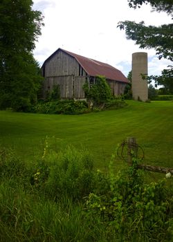 Well kept remains of an older barn and silo in Ontario, Canada