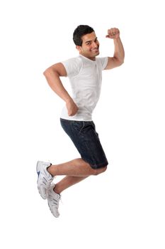 A thrilled excited man jumping into the air.   Jump for Joy.  Guy success or victory leap.  White background.