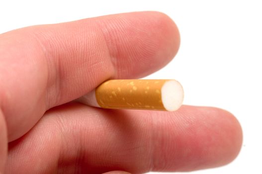 Closeup of hands holding a cigarette isolated on a white background.