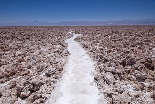 Path through the salt field in San Pedro de Atacama, Chile