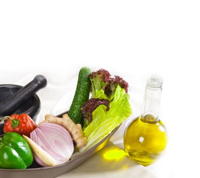 assorted fresh vegetables  and extra virgin olive oil, base for a healty diet and nutruition