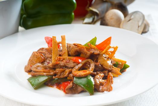 typical chinese dish,fresh beef stir fried with pepperrs bamboo sprout and mushrooms