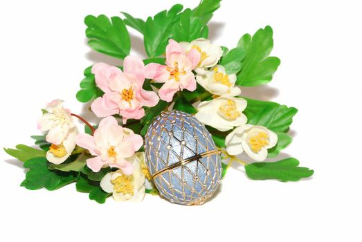 Easter beautiful egg decor with flowers isolated on the white.