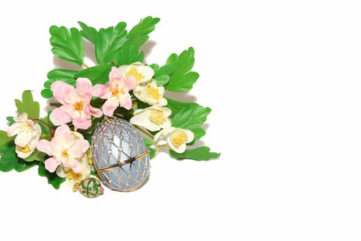 Easter beautiful egg decor with flowers isolated on the white. 