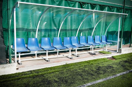 Coach and reserve benches in a soccer field