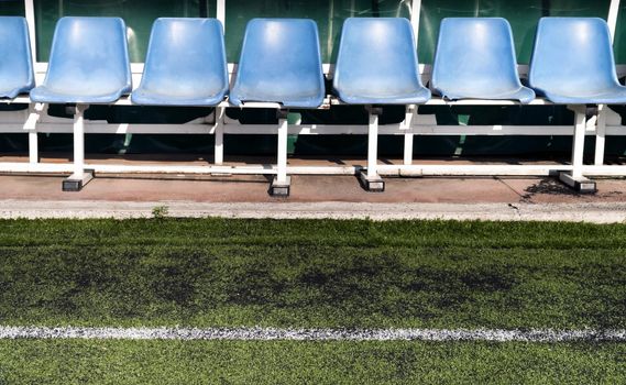 Coach and reserve benches in a soccer field