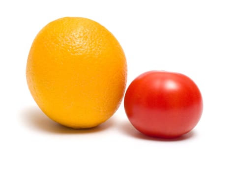 Orange and tomato it is isolated on a white background.