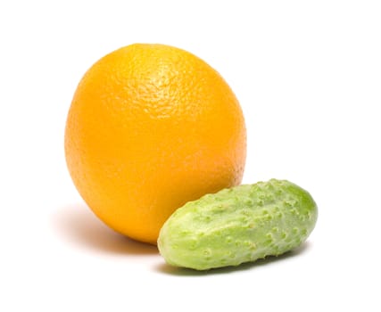 Orange and cucumber it is isolated on a white background.