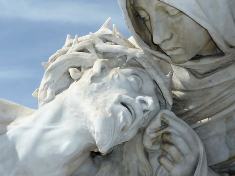 Close up of a white statue of Jesus head in the hands of virgin Marie, Marseilles, France