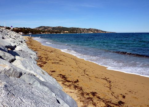 White rocks, beach of sand and mediterranean sea in a landscape of south of France