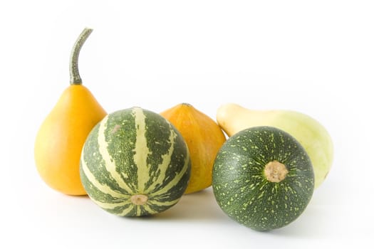 Decorative pumpkins on white background