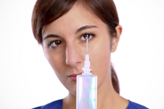 Closeup Photo Of A Cute Nurse Holding A Syringe 