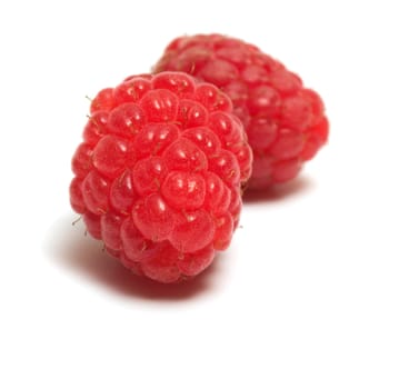 Two berries raspberry closeup isolated on a white background.