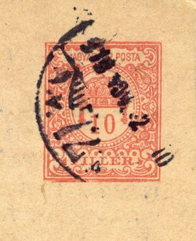 detail of vintage grungy postage stamp on postcard