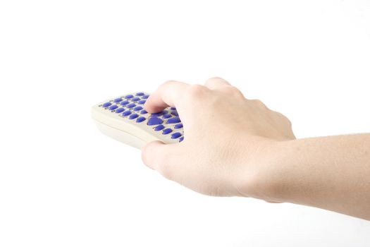 Hand holding a remote