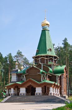 Wooden orthodox church in Russia, Urals shot in direct sunlight