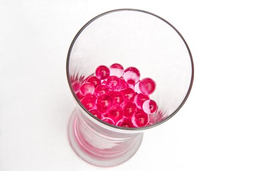 Pink gel ball inside the long vase