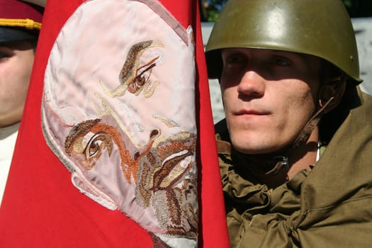 The soldier a protecting flag with image Lenin 22 06 2007 Kharkov Ukraine
