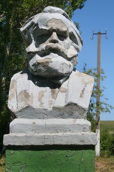 Monument Karl Marx in the deserted park in Ukraine