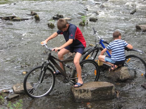 Stone ferry through the years{summer} river of children with bicycles Kharkov Ukraine 18.07.2008