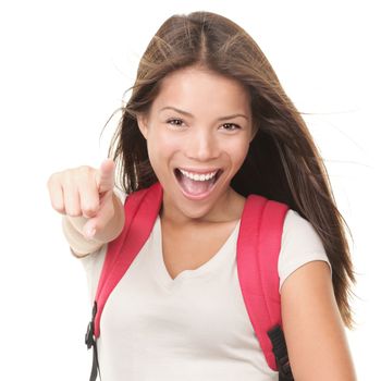 Female university student pointing excited and happy. Isolated on white background. Young mixed white / chinese model wearing school bag.