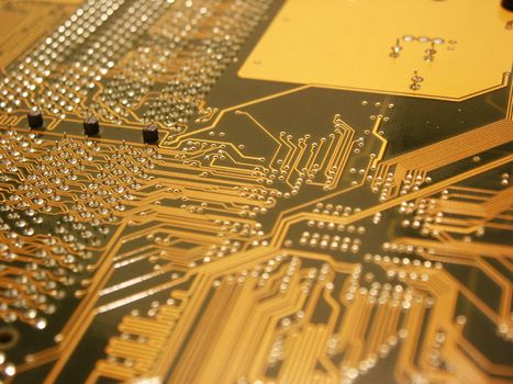 A shot of the back side of a new dual processor computer mother board.  This image is a nice background image for print material related to computer technology.