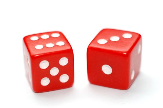Two red dice isolated on white background