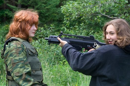 Airsoft thriller: two girls and gun
