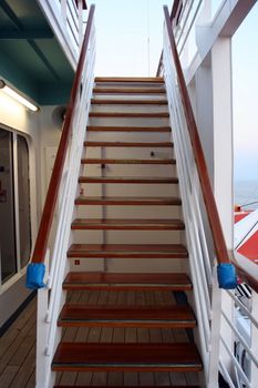 A staircase to the next level on a cruise ship.