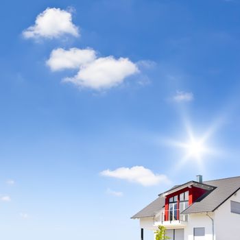 An image of a nice blue sky background with a house