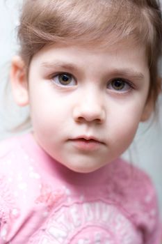 portrait of a serious little girl