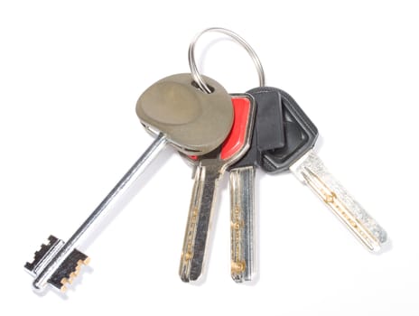 close-up bunch of keys, isolated on white