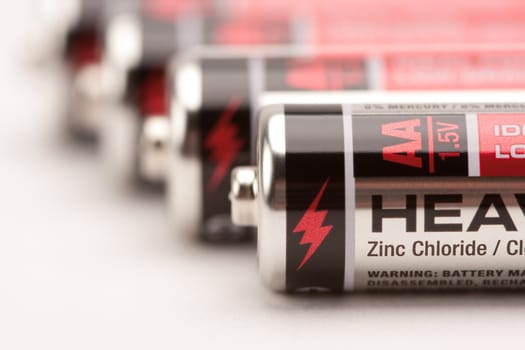 Heavy Duty AA Batteries on a White Background.