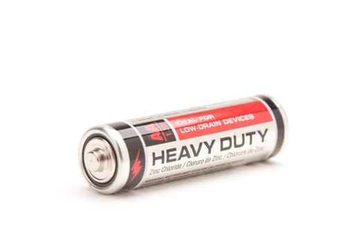 Single Heavy Duty AA Battery Isolated on a White Background.