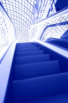 futuristic interior of the building with escalator