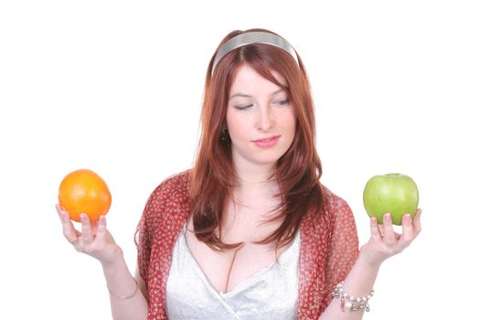 Pretty woman with green apple and orange, with copy-space