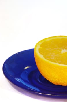 some oranges on a plate