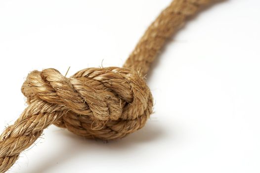 a macro picture of a rope on white