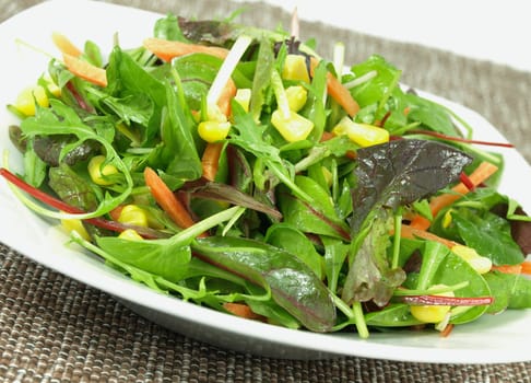 Bowl of baby greens salad