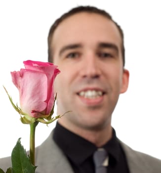 Closeup view of a romantic man and a rose, isolated against a white background