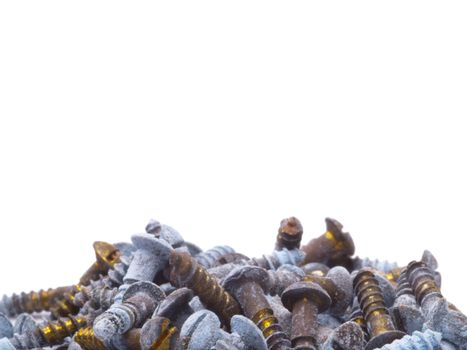 some old brass screws isolated on white background