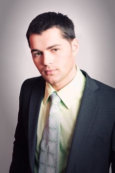 Portrait of Young man wearing suit with tie