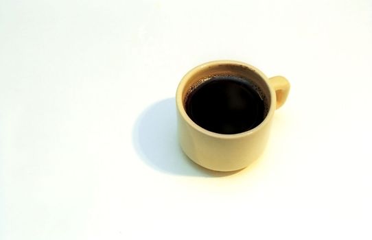 A cup of black coffee on white background