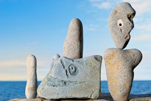 Freakish stones in morning light on the bank of northern sea