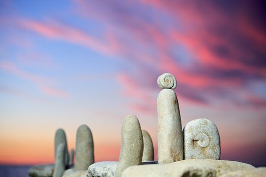 Sea stones in evening light on a beach in the summer