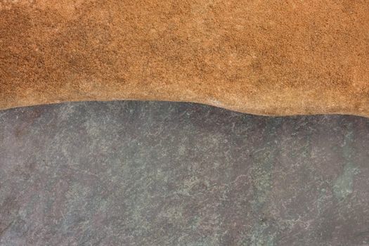 abstract landscape created with flat stepping stones - red sandstone and purple, green slate rock