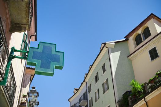 Little town farmacy sign on a wall